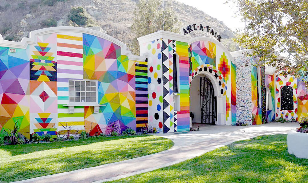 Laguna Art-A-Fair building entrance painted with various geometric shapes in vibrant colors.